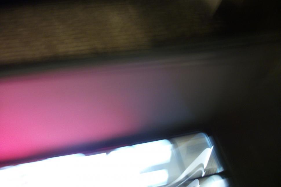 Free Image of Blurry Pink and White Object 