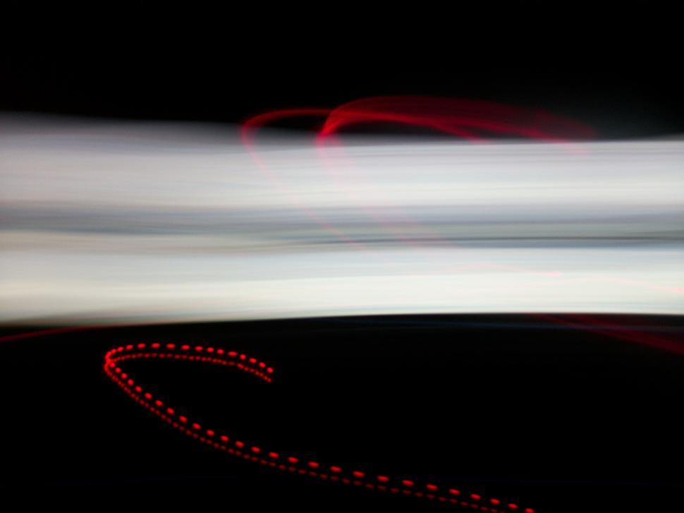 Free Image of Blurry Red and White Object 