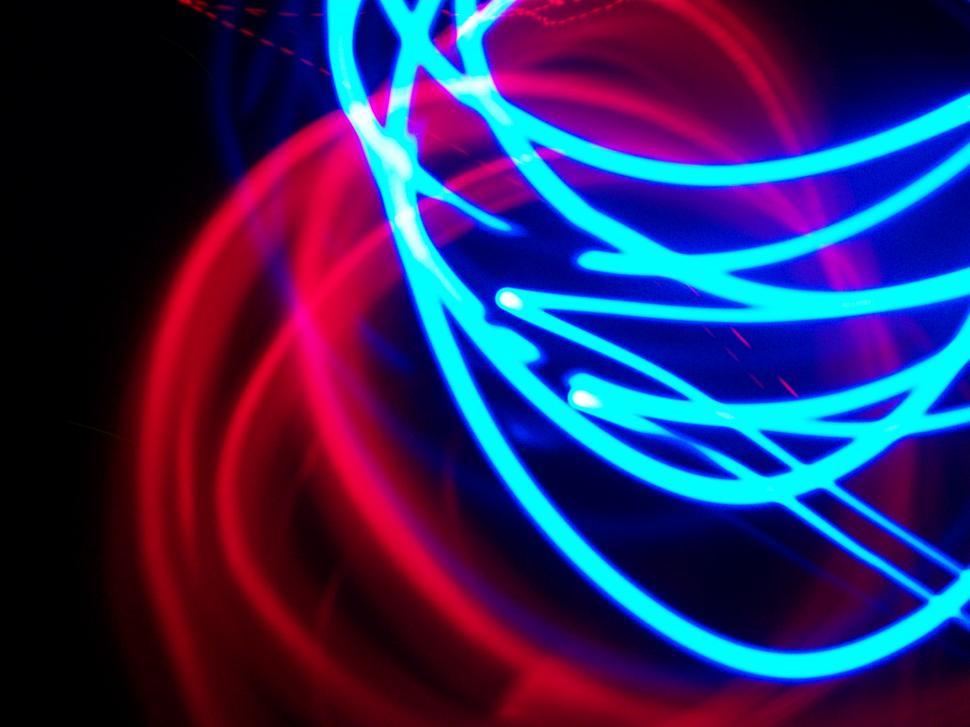 Free Image of Blurry Photo of Blue and Red Lights 