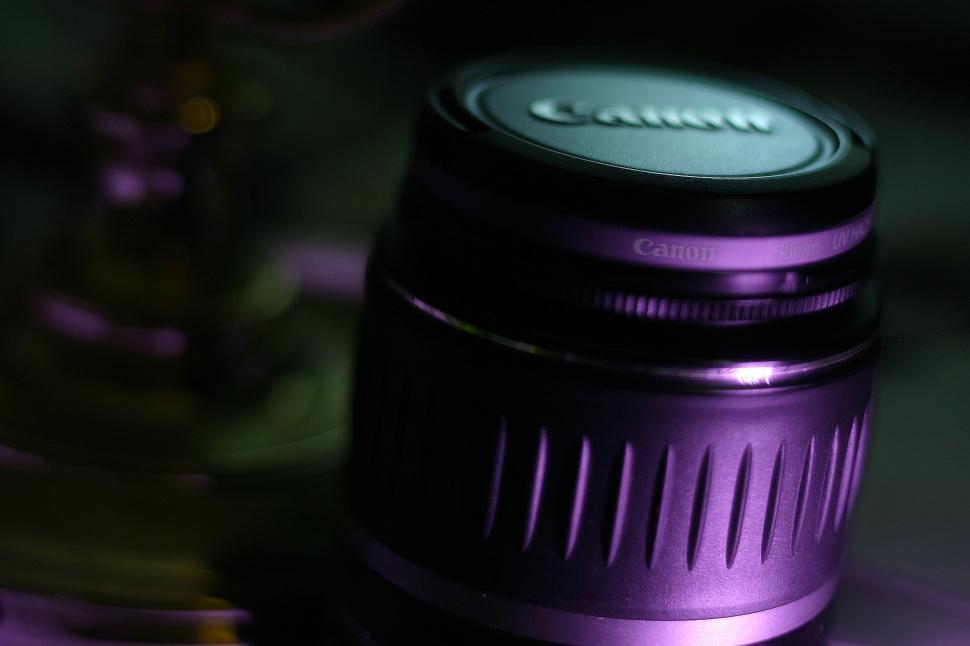 Free Image of Close Up of Camera Lens on Table 