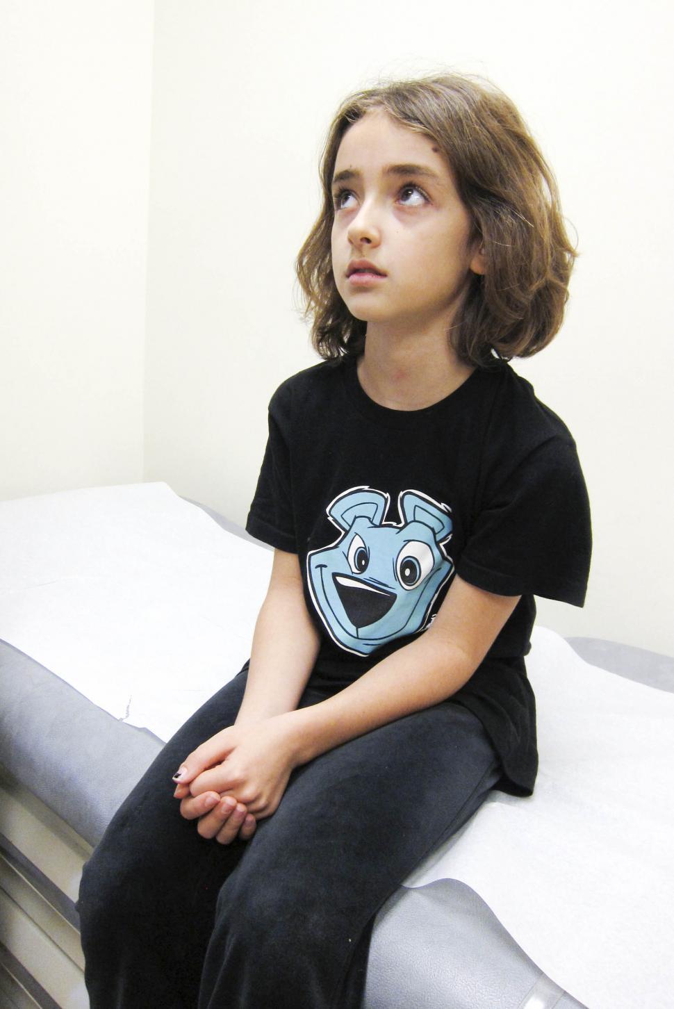 Free Image of Child Waits for Health Care 