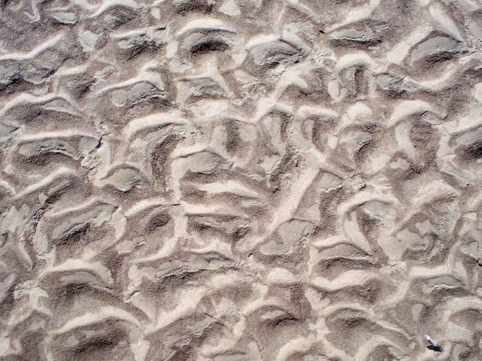 Free Image of patterns in the sand - dry river bed 