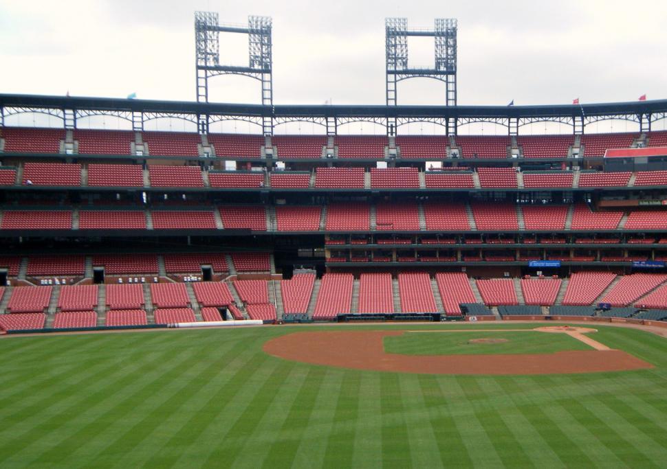 Free Image of Baseball stadium playing field with empty seats 