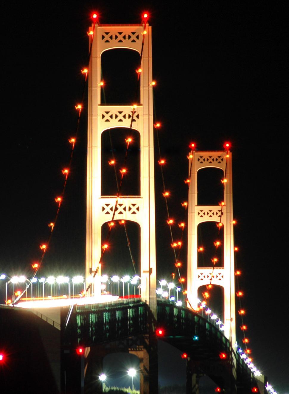 Free Image of Tall Bridge Illuminated With Lights 