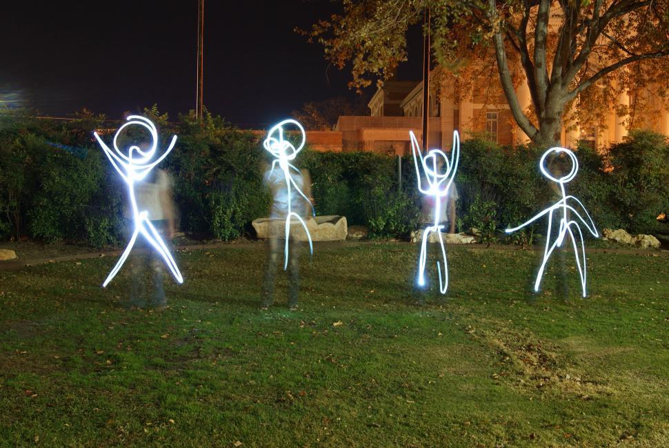 Free Image of Stick Figures painting with light photography 