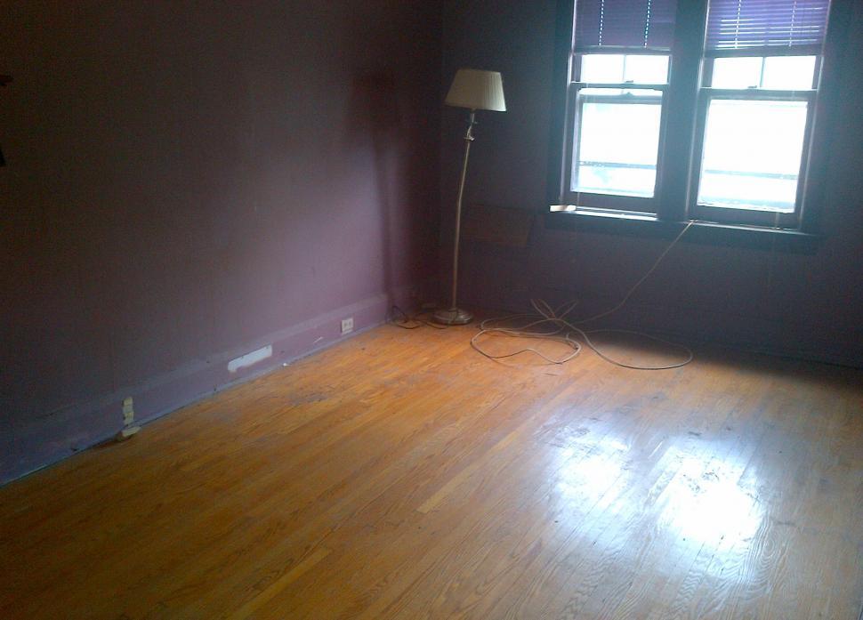 Free Image of Empty Room With Lamp on Floor 