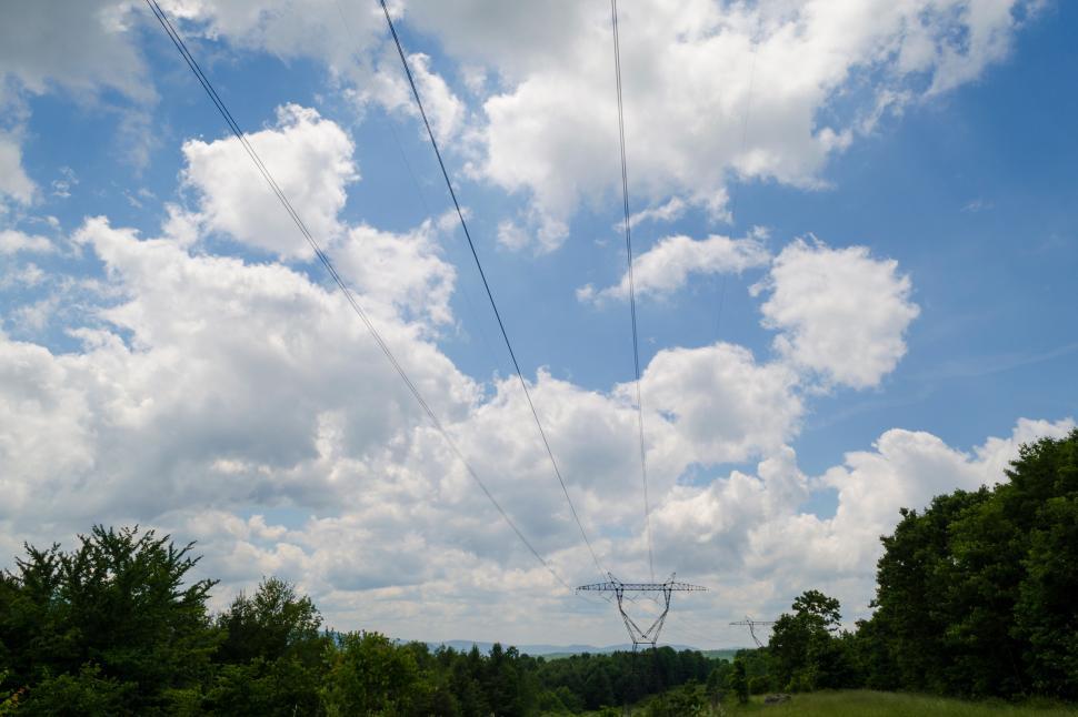 Free Image of Electrical Wires against Partly Cloudy Skies 