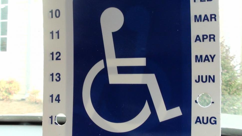 Free Image of Handicap sign for an individual 