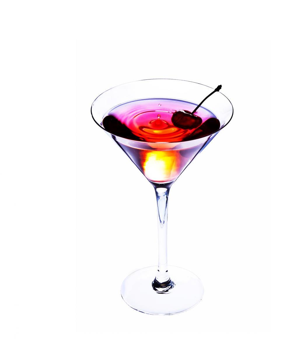 Free Image of Martini Glass With Red Liquid and Cherry Garnish 