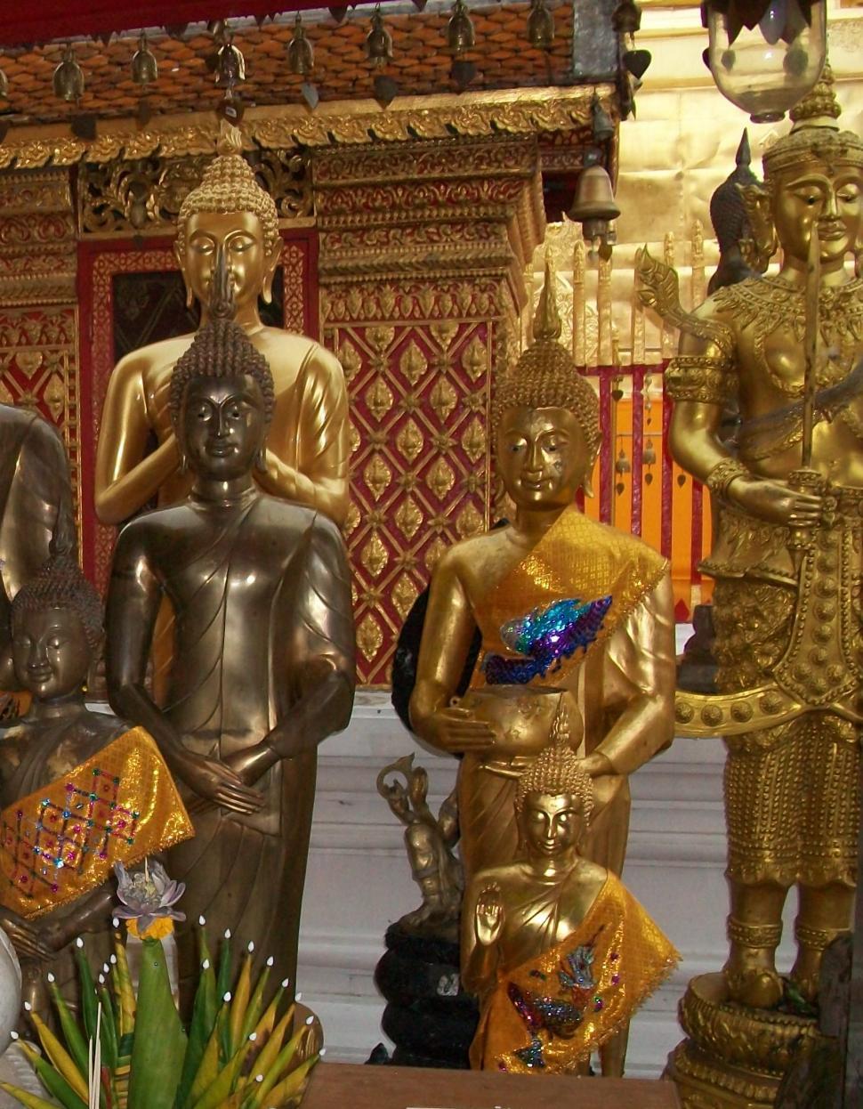 Free Image of Gold and Brass Buddhist Statues 