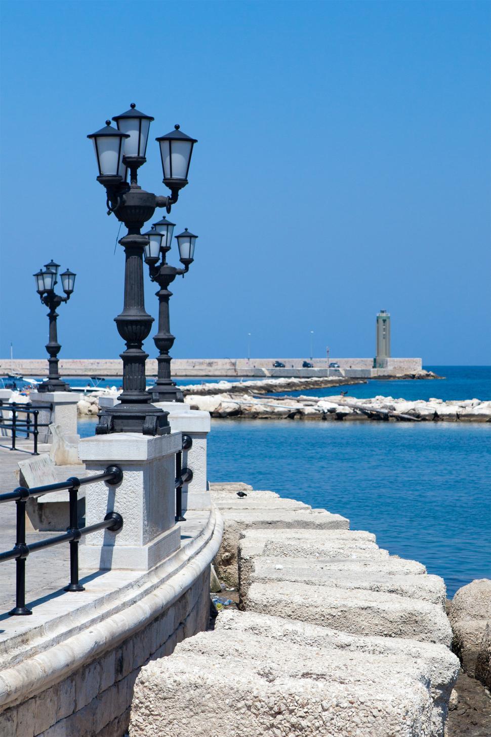 Free Image of Street Lamps And Sea With Blue Sky - Bari, Italy  