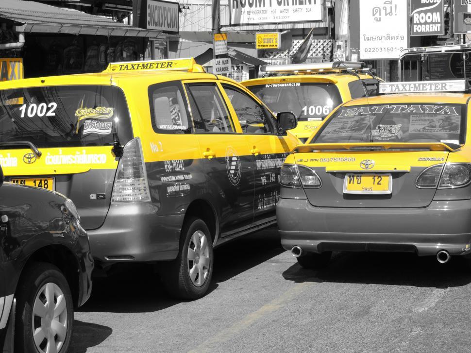 Free Image of Taxi Cabs on a City Street 