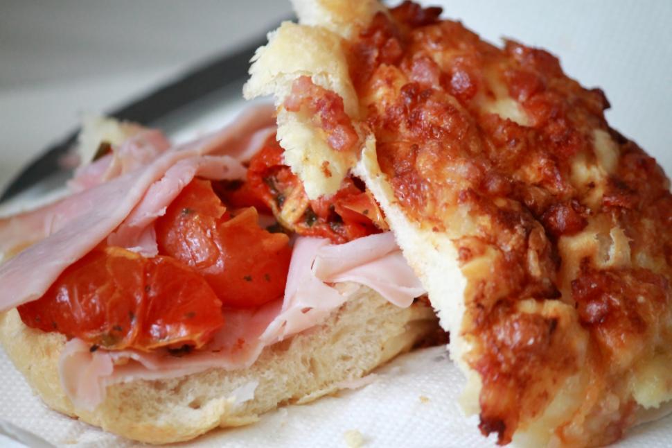Free Image of Sun dried tomatoes and ham sandwich on savoury bread. 