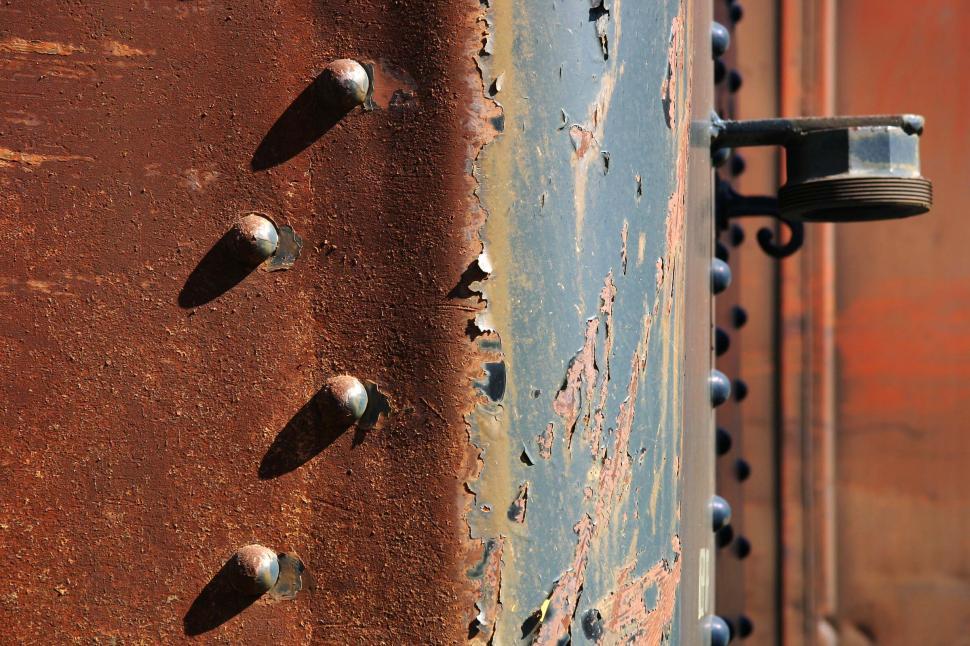 Free Image of train rust decay rivet metal peel decommission scrap texture peeling paint fixture threads 
