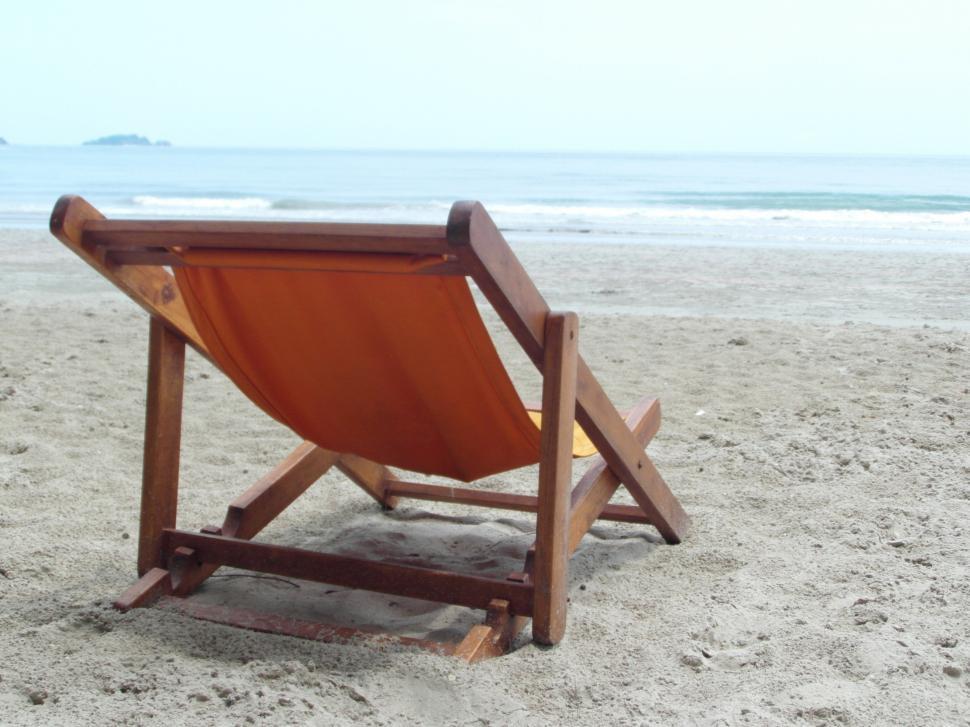 Free Image of Deckchair on an Empty Beach  