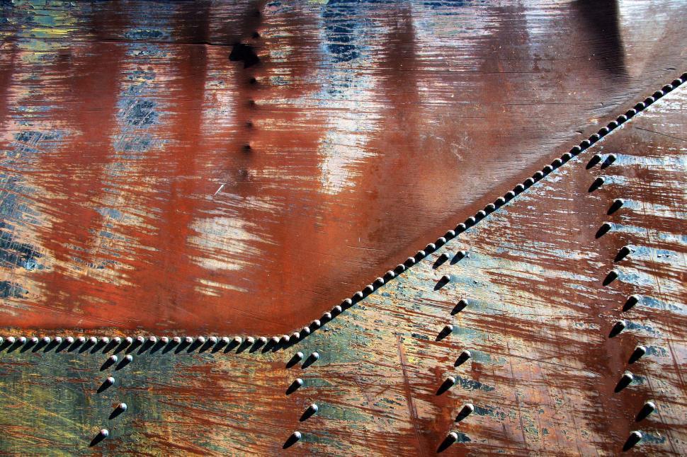 Free Image of Close Up of Wood With Metal Rivets 