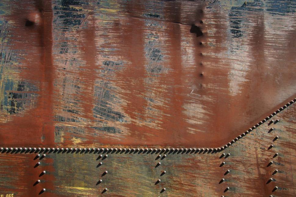 Free Image of train california rust decay rivet metal scrap texture scrape scratch scratches scratched wall tank line dent dents rib 