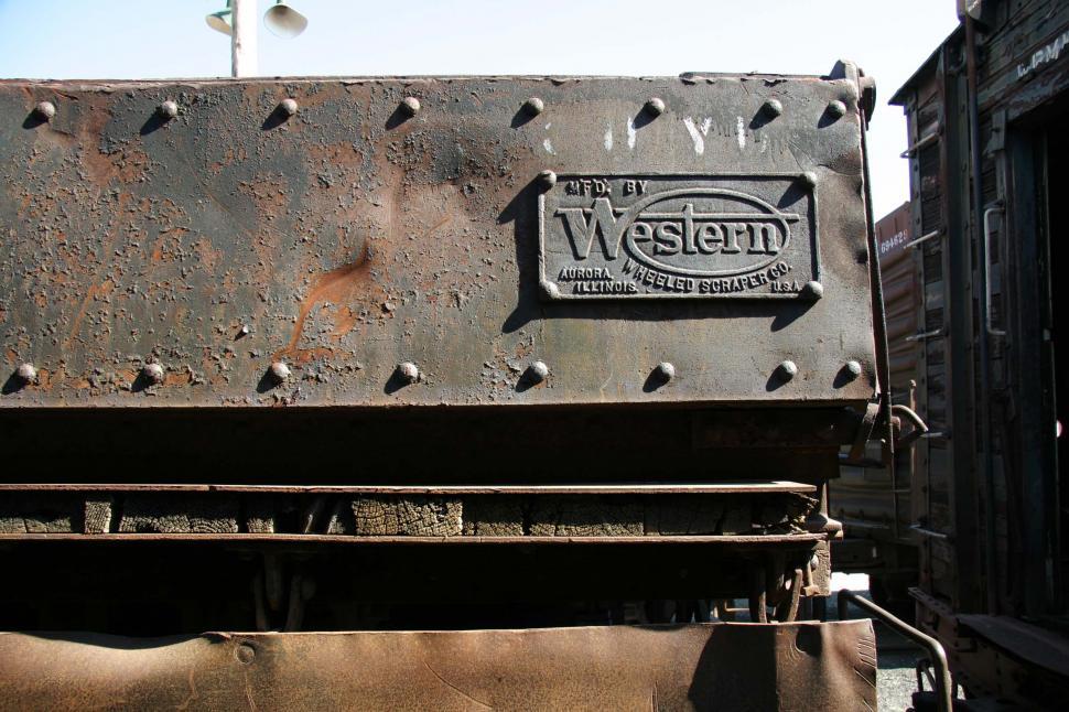 Free Image of train california rust decay rivet word metal peel scrap texture machine western wheeled scraper aurora illinois car plaque peeling 