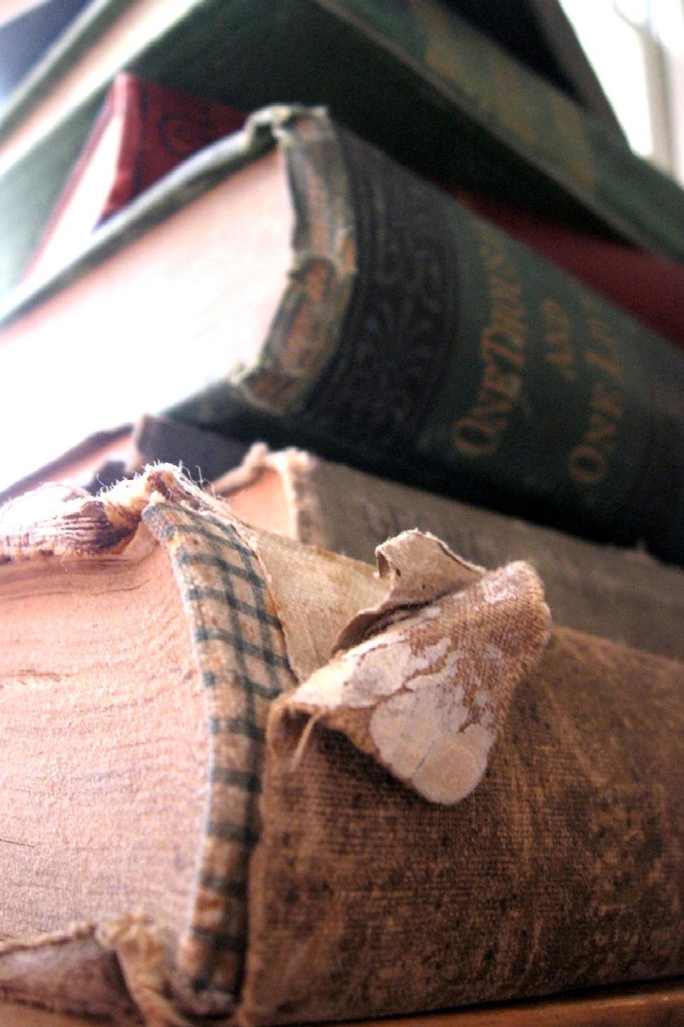 Free Image of A Pile of Books on a Wooden Table 