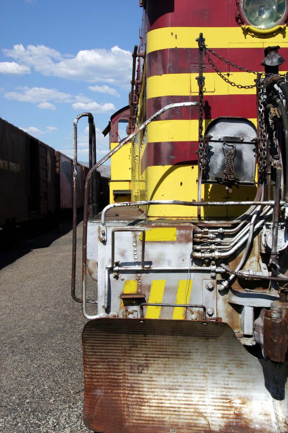Free Image of train california rust decay metal scrape locomotive engine cab blade hose fitting hydraulic railing 
