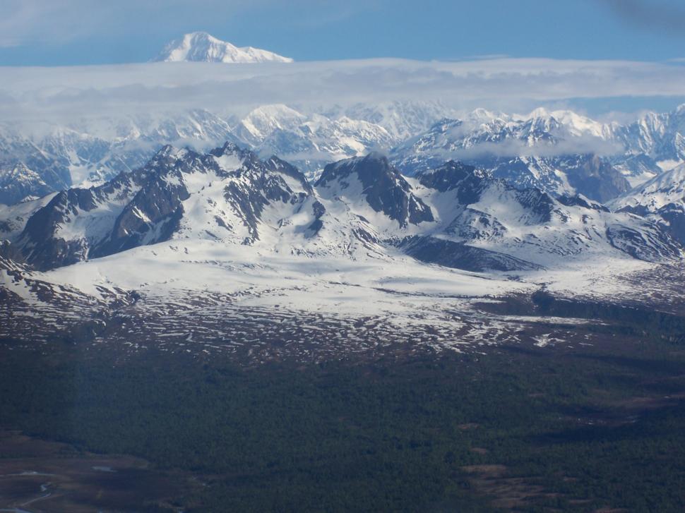 Free Image of Snow Covered Mountains Viewed From A Plane  