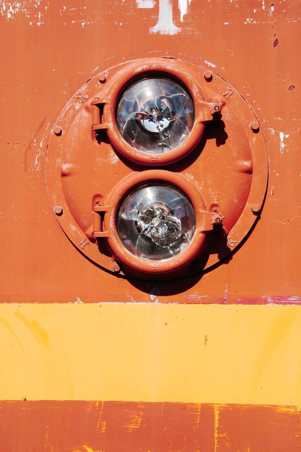 Free Image of train decay metal texture stripe light headlight lens circle round bolt porthole 