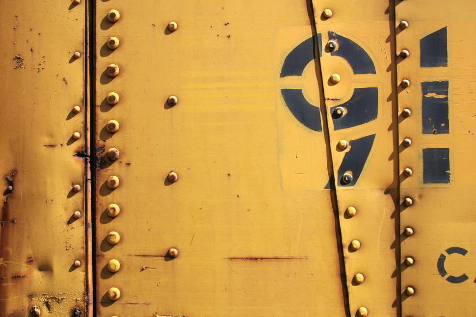Free Image of train rust decay rivet metal texture line yellow numbers 91 number seam 