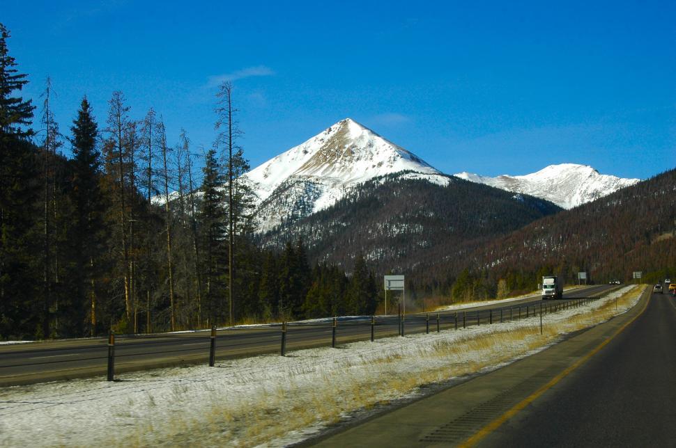 Free Image of Mountain Highway through the Snow Capped Mountain 