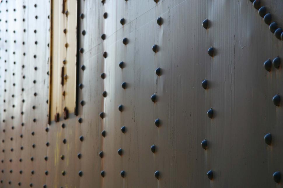 Free Image of Detailed Close Up of Metal Surface With Rivets 