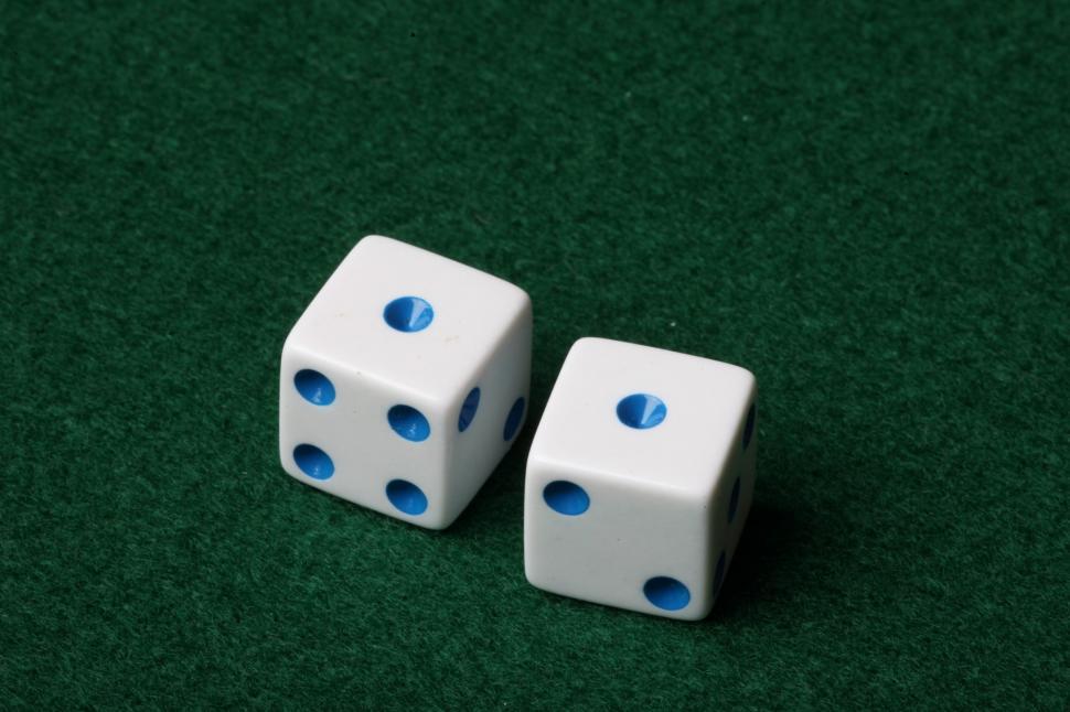 Free Image of Two dice on green felt 