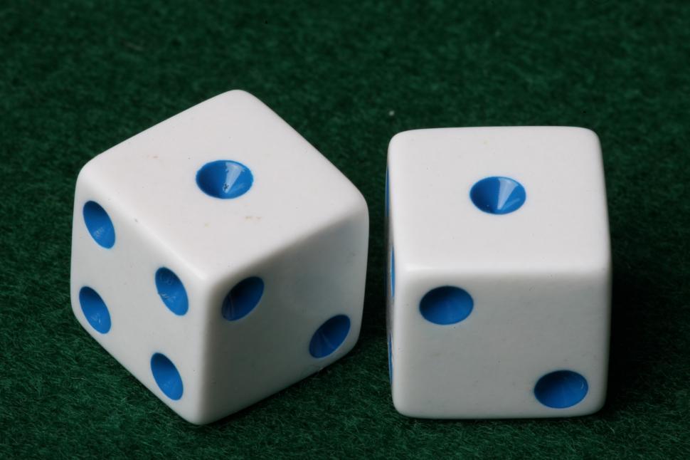Free Image of Two dice on green felt 