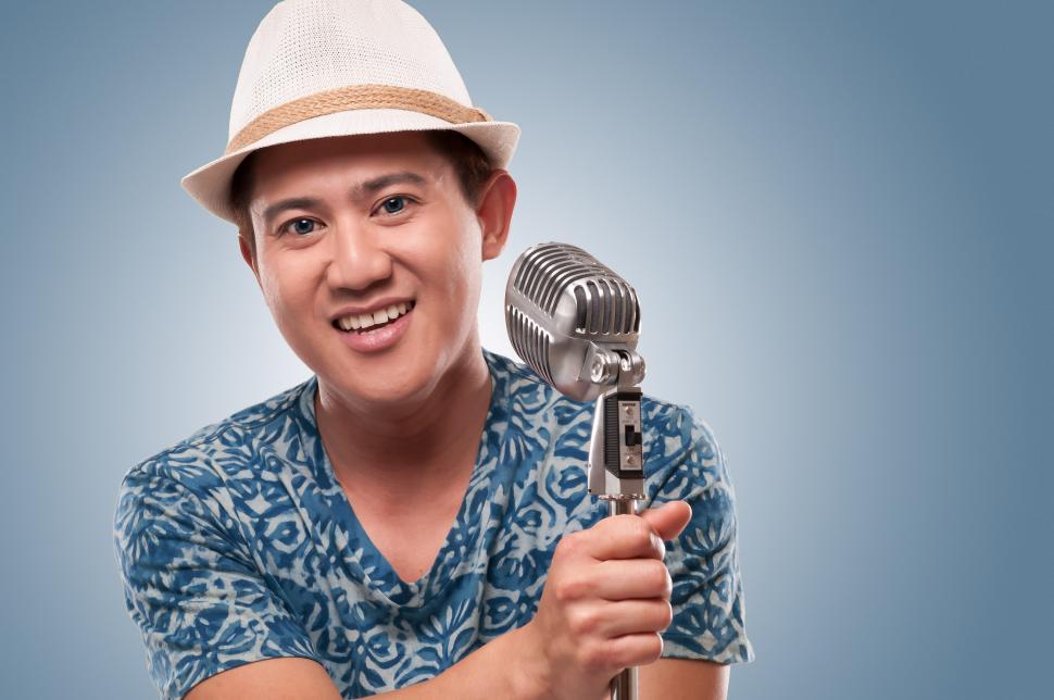 Free Image of Young Man with Microphone 
