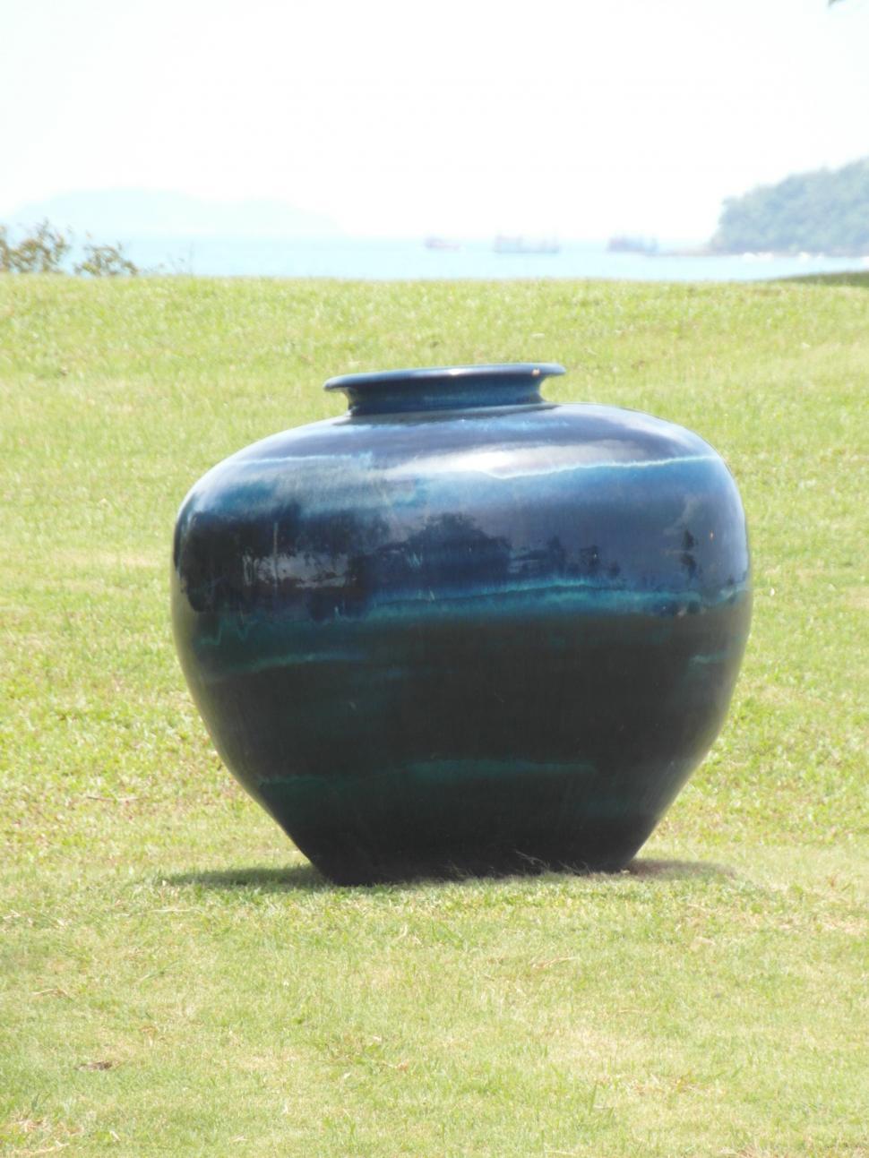Free Image of Large Vase in Ocean-Side Garden 