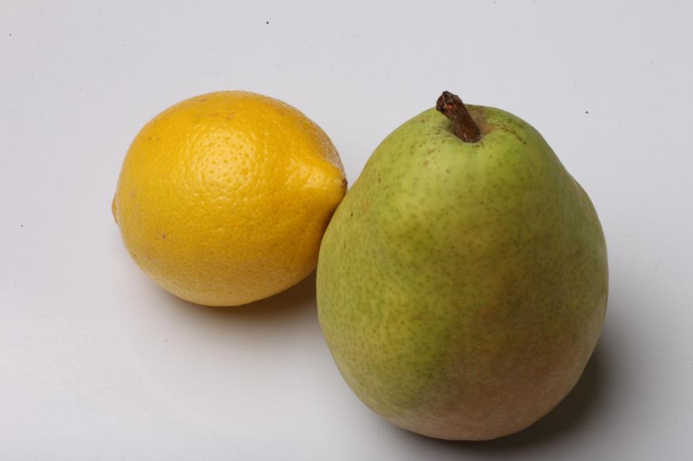 Free Image of Pear and Lemon isolated on white background. 