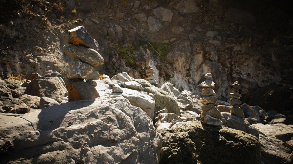 Free Image of Rock Stacking by the Ocean 
