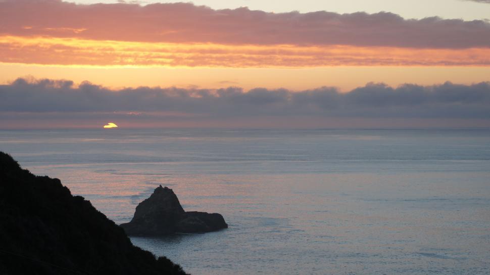 Free Image of Sunset over the Mountain Coastline 