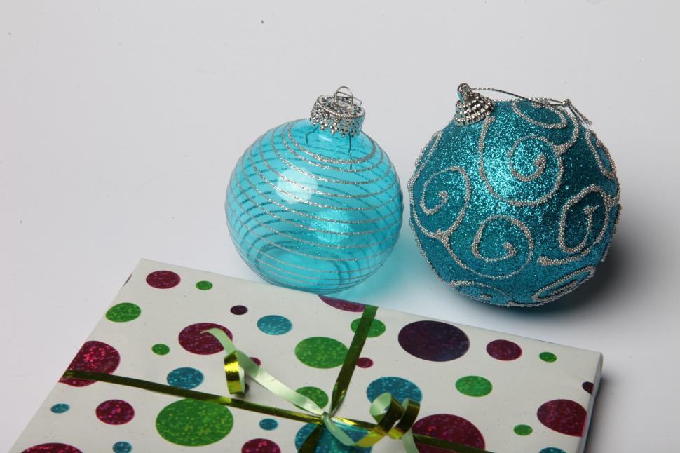 Free Image of Blue Christmas ornaments with present 