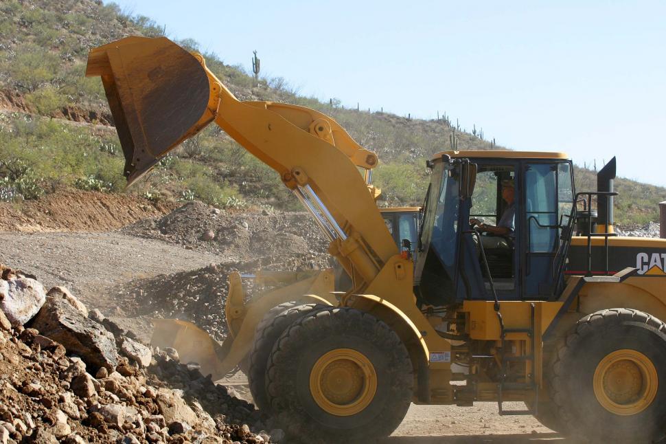 Free Image of Front loader going for dirt 