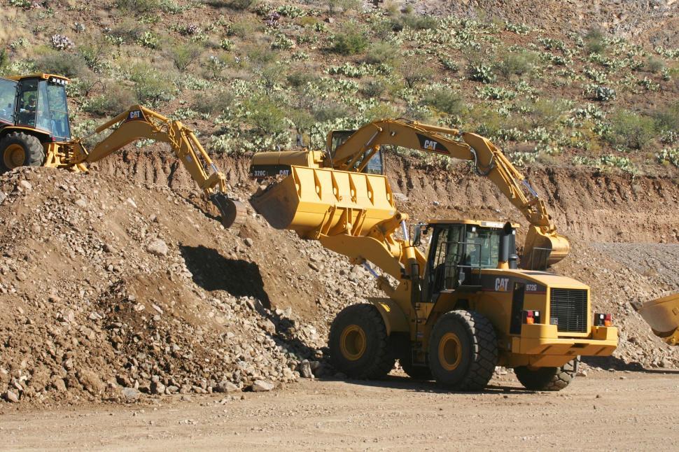 Free Image of Excavators and front loaders at work 