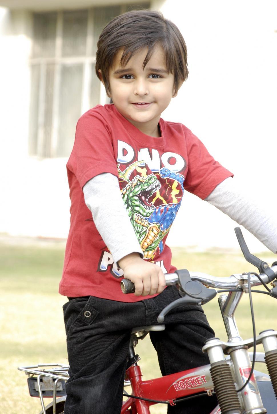 Free Image of Cute Kid with Bicycle 
