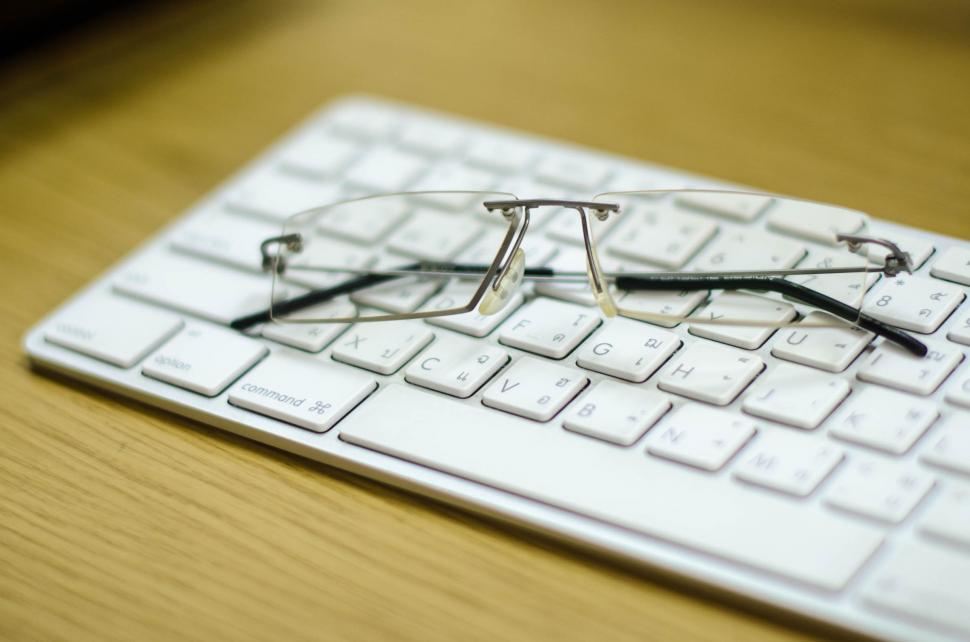 Free Image of Glasses on Keyboard 