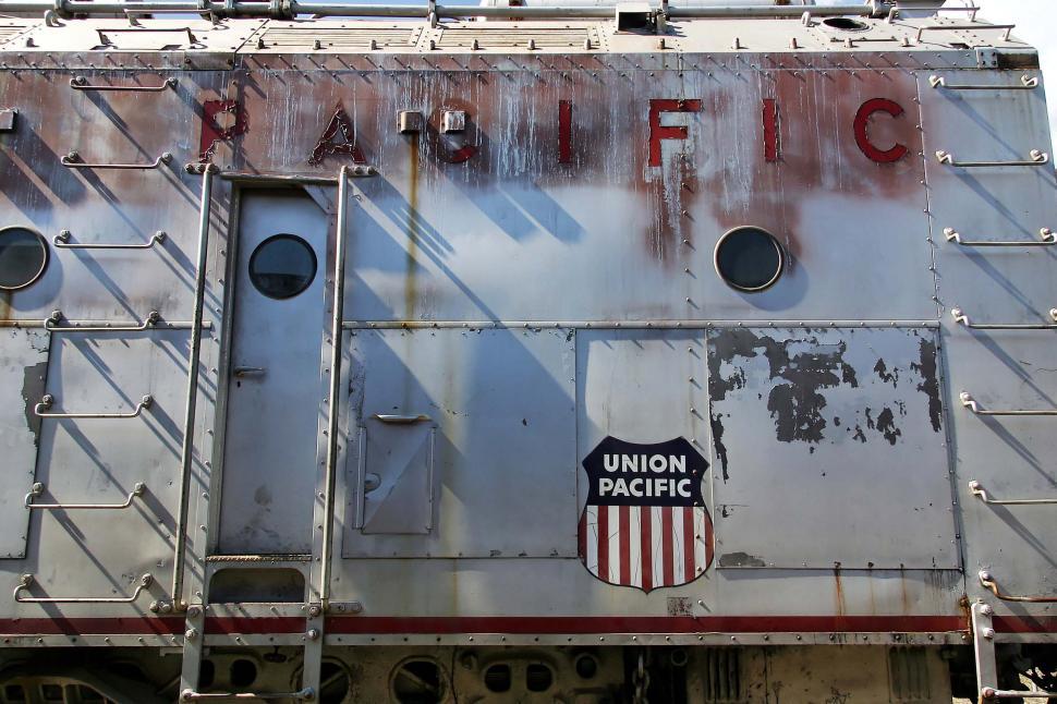 Free Image of train california union pacific rust decay rivet word metal peel locomotive decommission scrap texture machine peeling porthole paint ladder door shield words 