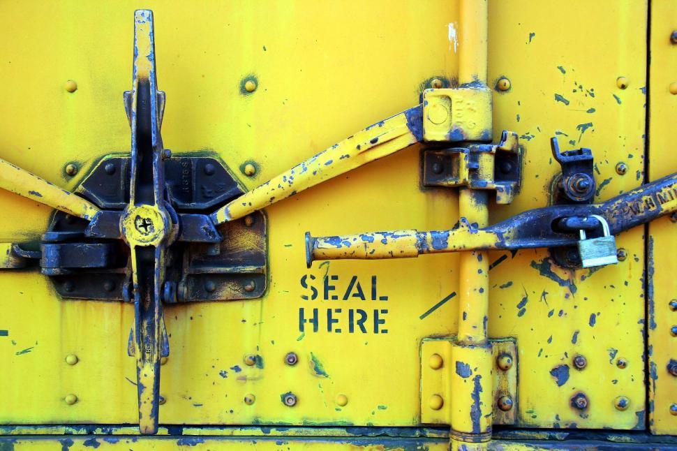 Free Image of train decay rivet word metal peel locomotive texture machine handle worn wear words seal here lock padlock hinge yellow door 
