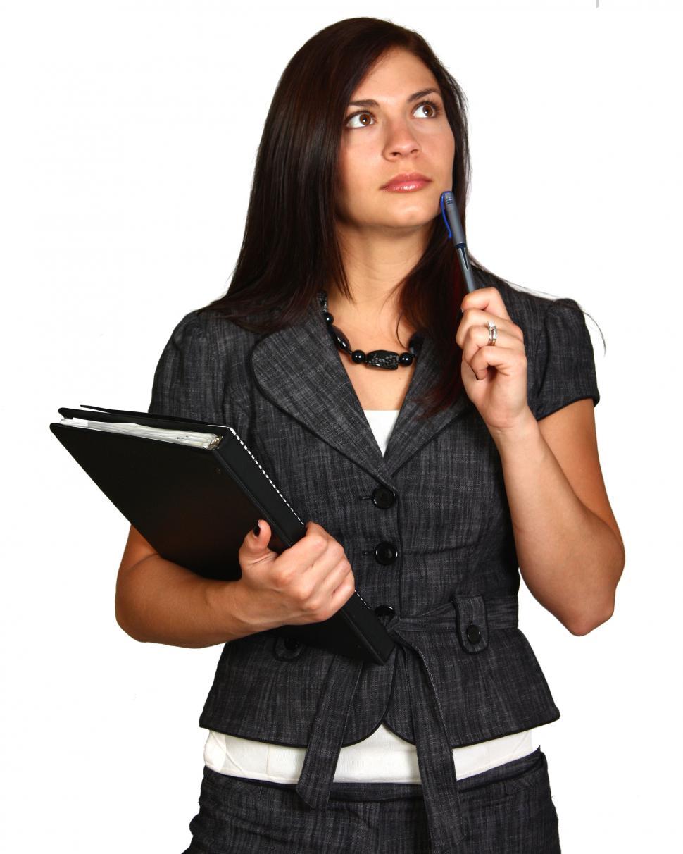 Free Image of A Beautiful Young Business Woman Thinking 