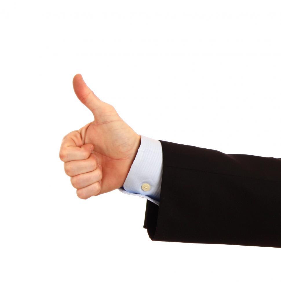 Free Image of A Young Businessman Making A Thumbs Up Gesture 