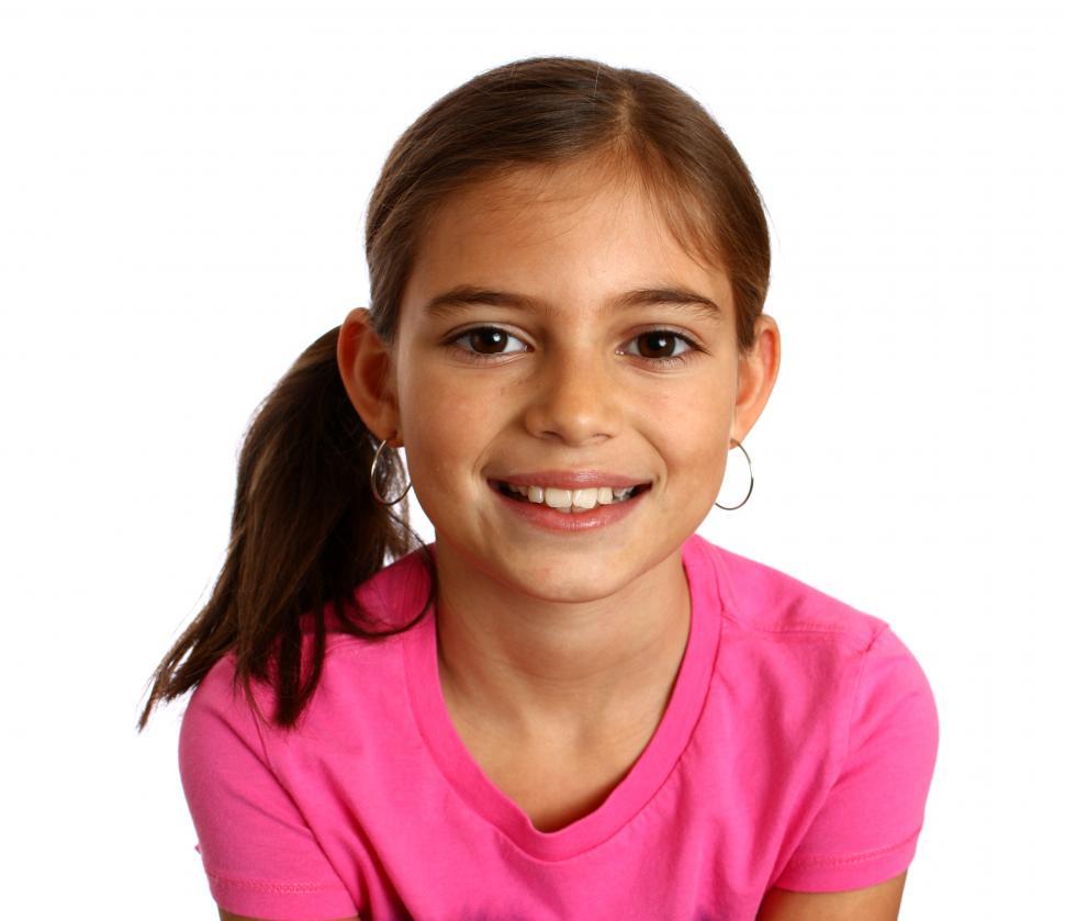 Free Image of A cute young girl wearing a peace symbol t-shirt 