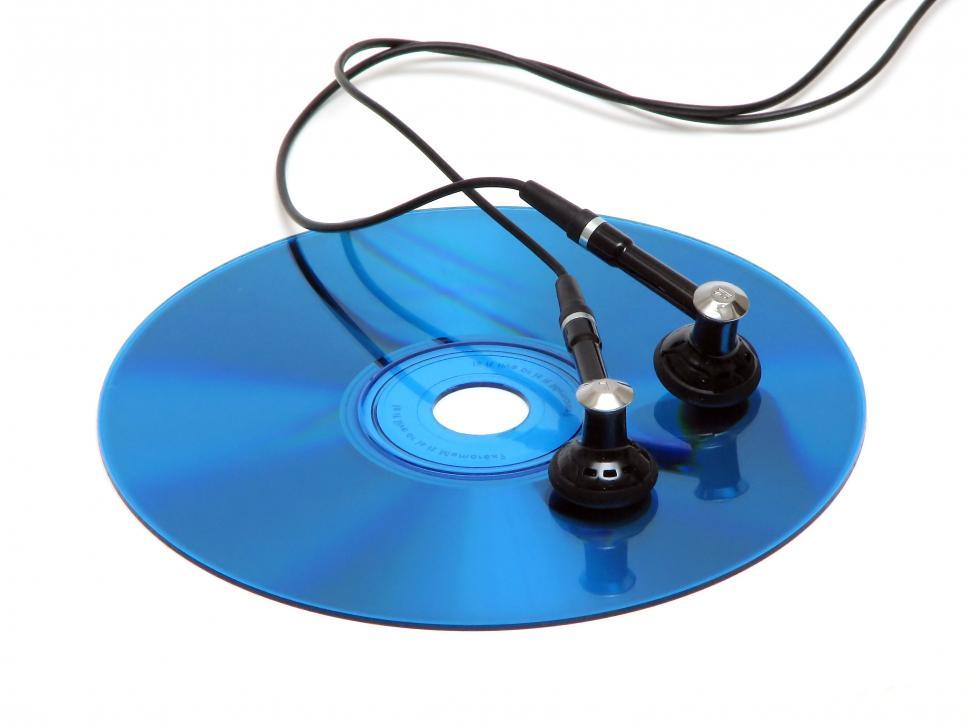 Free Image of A blue cd with headphones isolated on a white background 