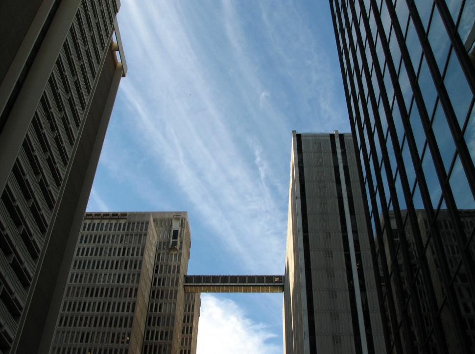 Free Image of Modern buildings with a blue sky background 
