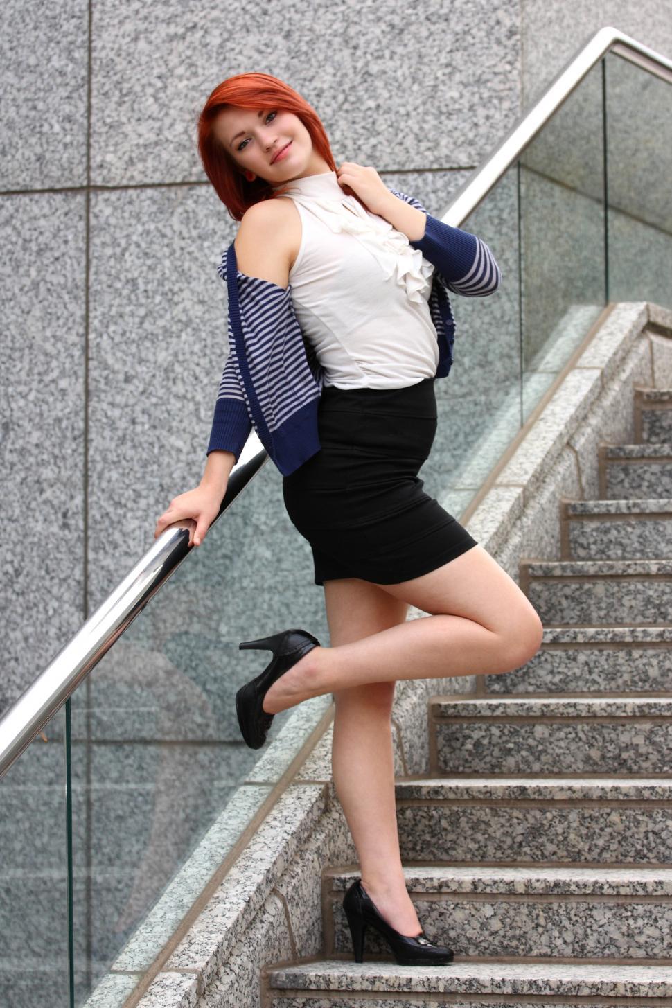 Free Image of A beautiful young woman in business attire 