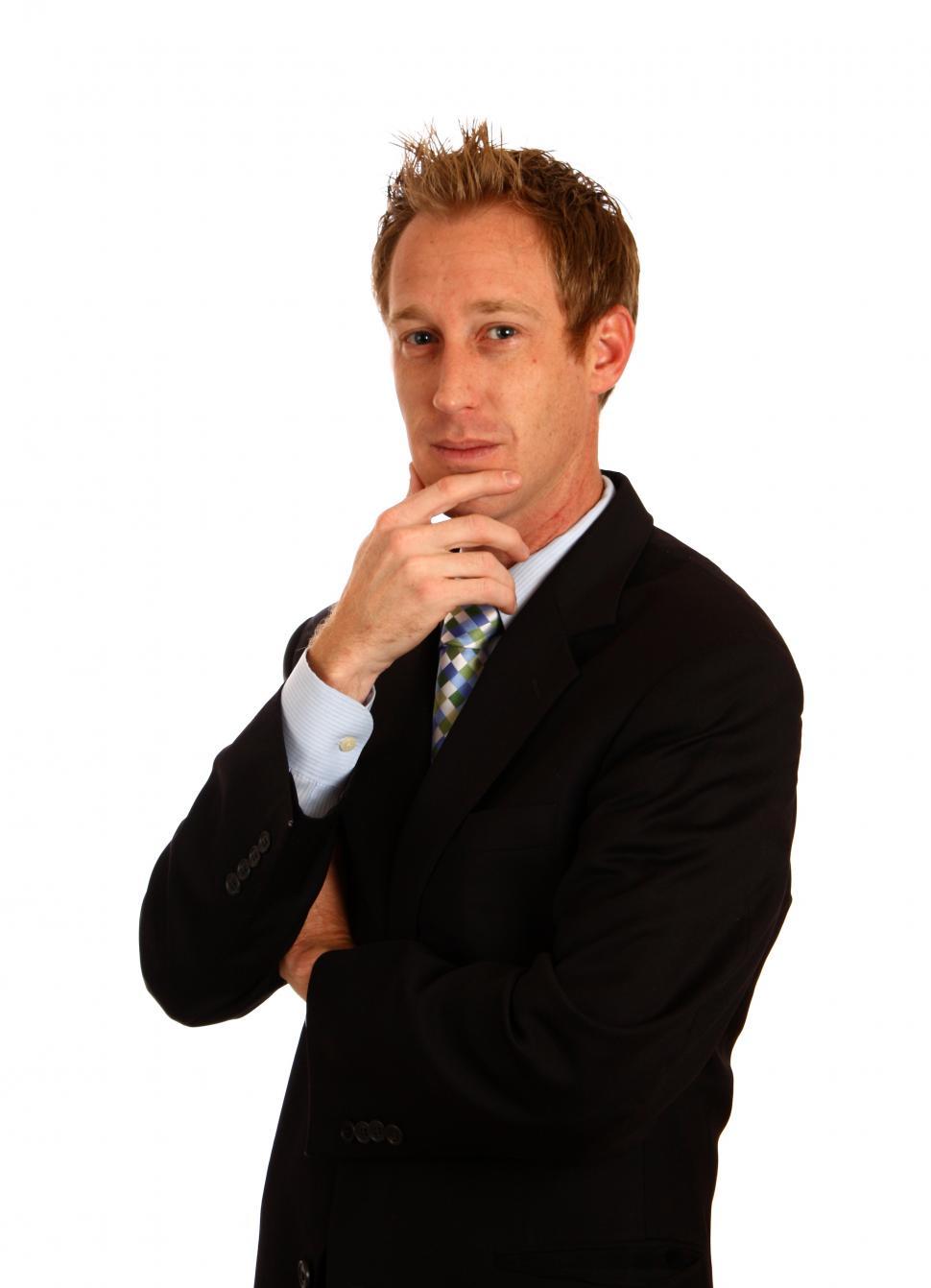 Free Image of A young businessman in a suit isolated on a white background 